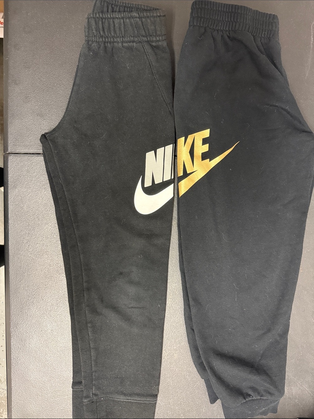 Nike Black Sweatpants with White and Gold Logo